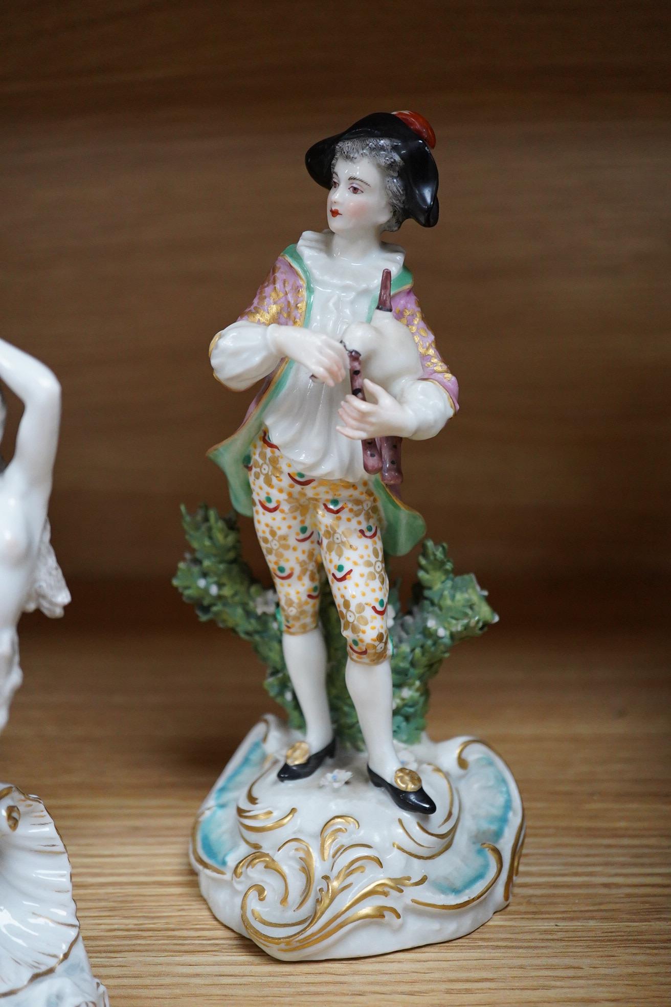 A Meissen seated figure emblematic of sense of smell, and three pairs of Continental porcelain figures, (7) tallest 19cm.